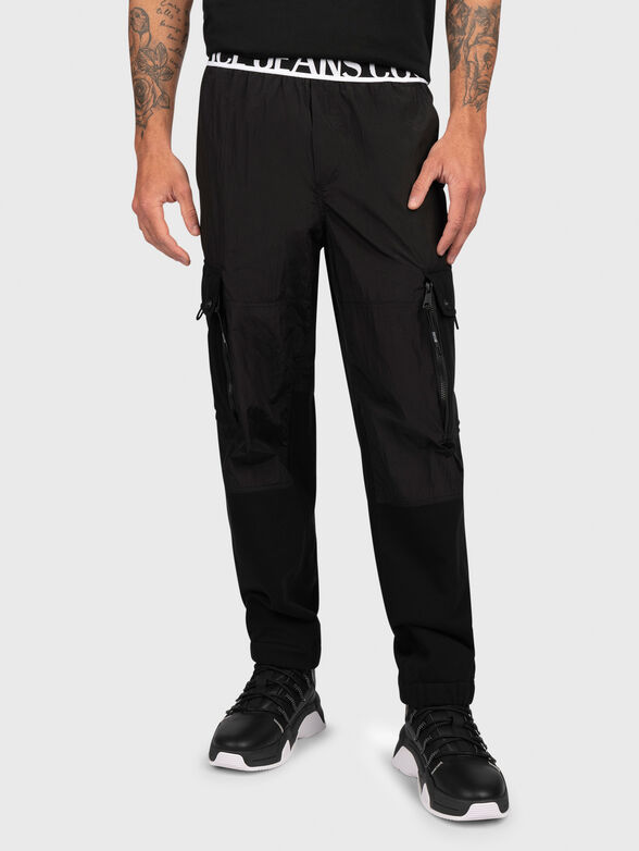 Black track pants with logo detail - 0