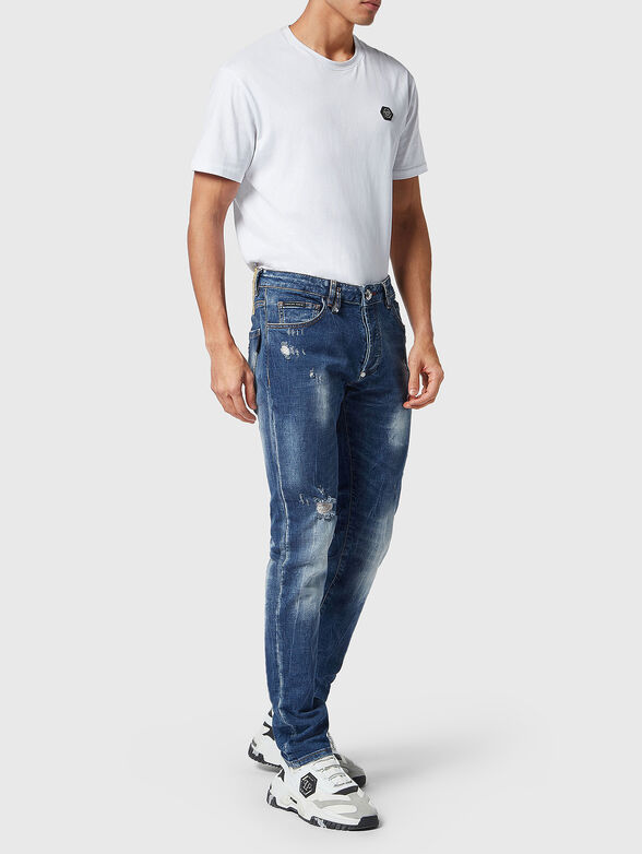 Blue jeans with washed effect and accent rips - 4