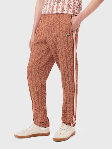 Sports trousers with monogram print - 3
