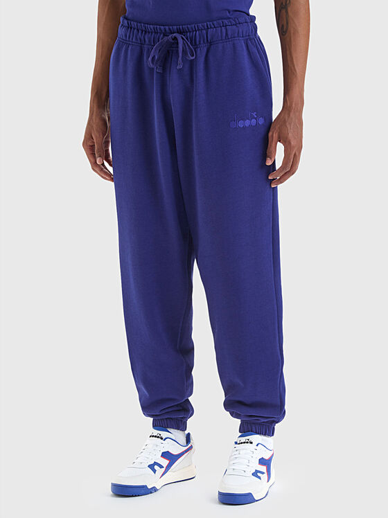 Blue sports pants with logo element - 1