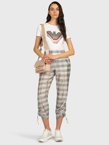 Pants with a checkered print - 3