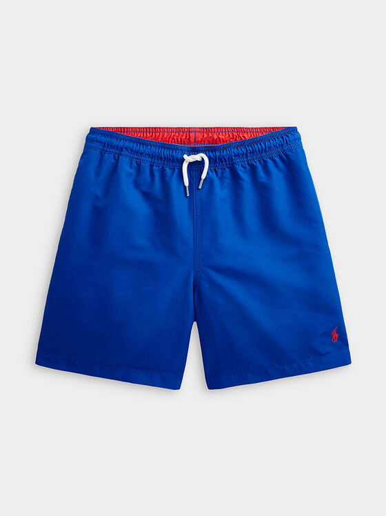 Blue swim trunks with logo accent - 1