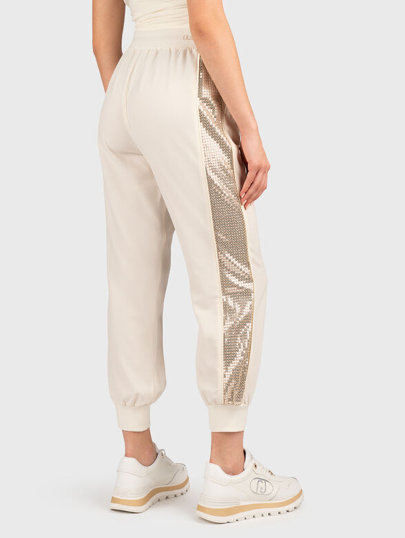 Sports trousers with sequins and logo - 2