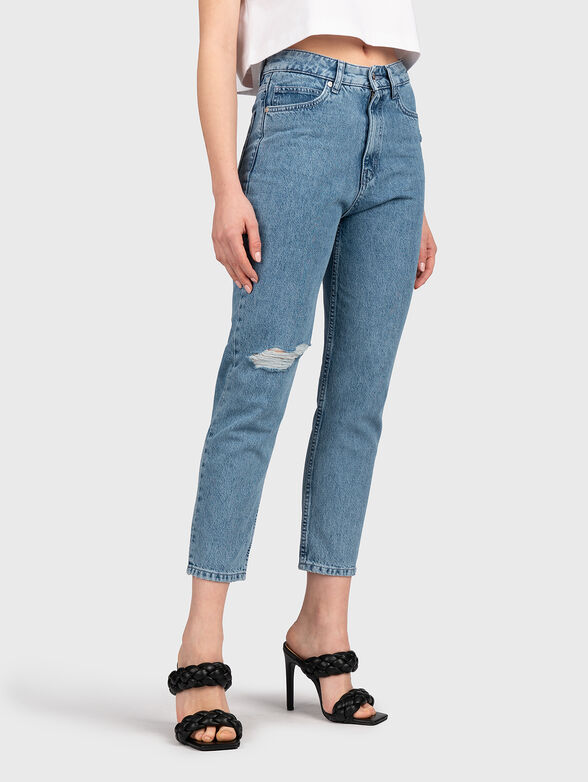 Blue jeans with distressed effect - 1