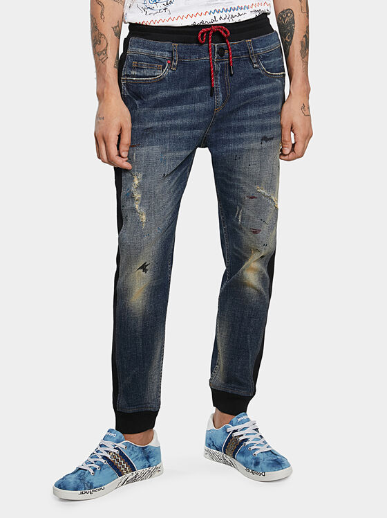 Jeans with textile details - 1