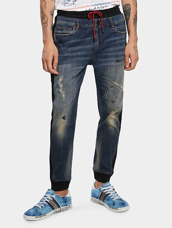 Jeans with textile details - 1