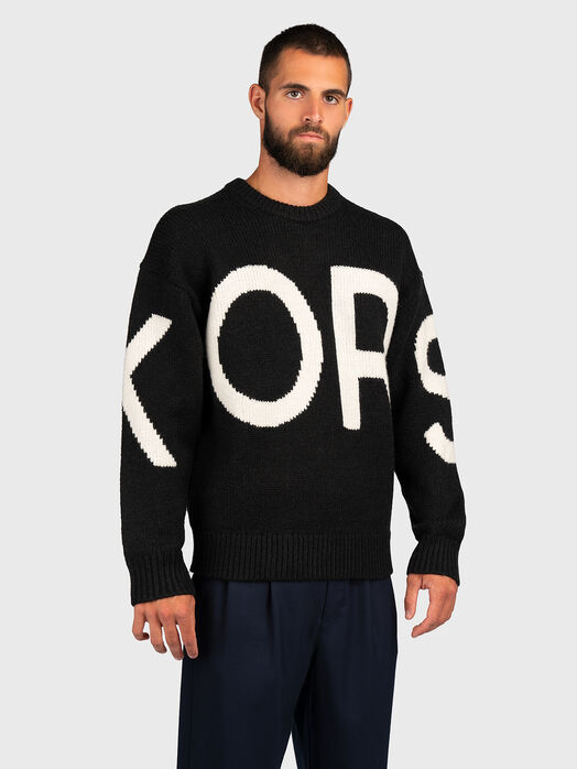 Knitted sweater in black color