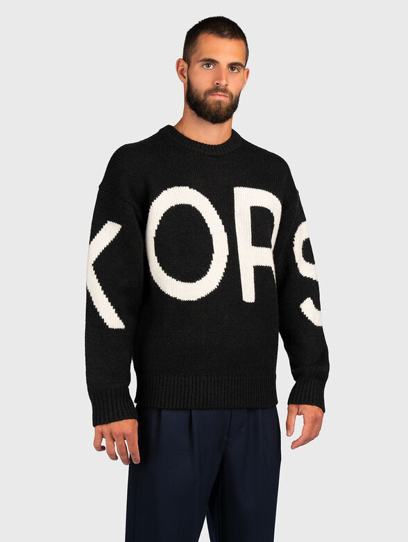 Knitted sweater in black color - 1