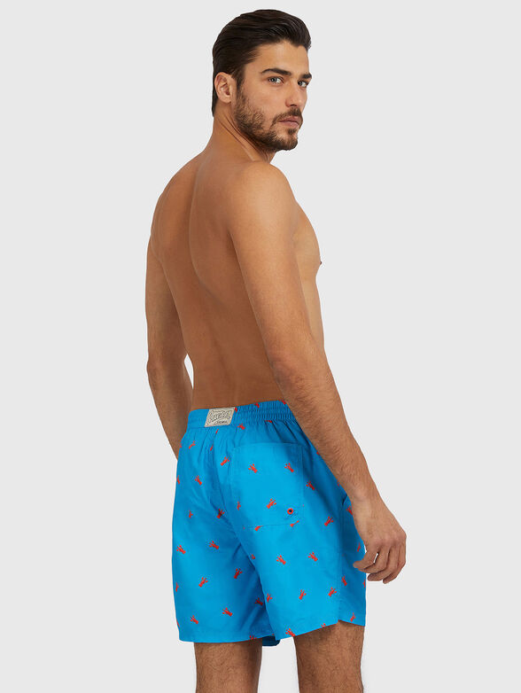 Blue beah shorts with print - 2