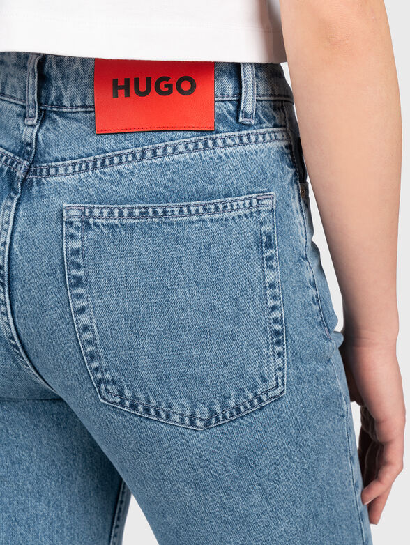 Blue jeans with distressed effect - 3