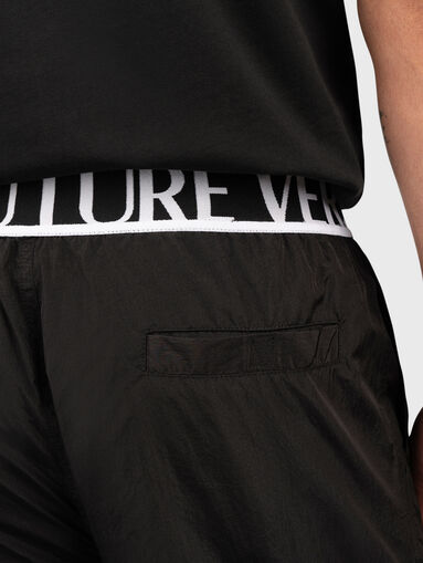 Black track pants with logo detail - 2