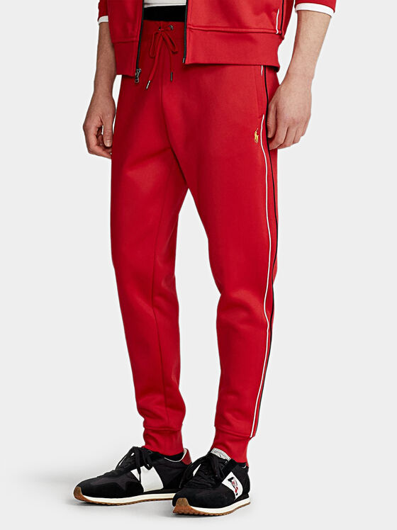 Αθλιτικό παντελόνι σε κόκκινο χρώμα - 1