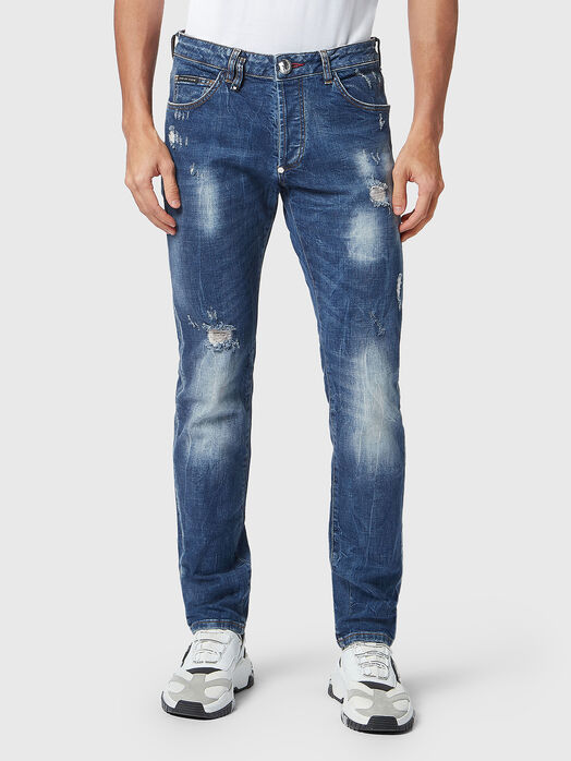 Blue jeans with washed effect and accent rips
