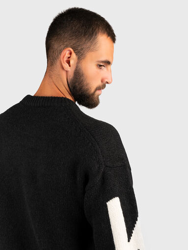 Knitted sweater in black color - 4
