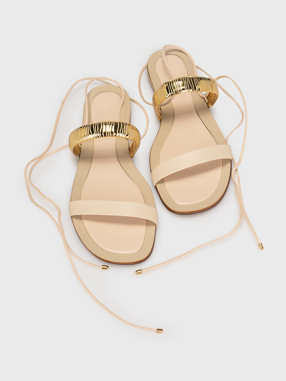 Beige flat sandals with gold accent - 6
