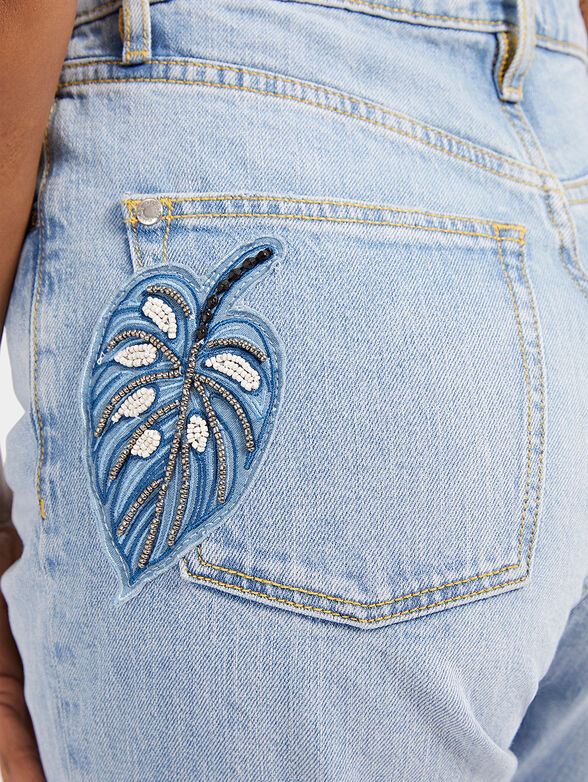 Light blue jeans with beaded accent - 3