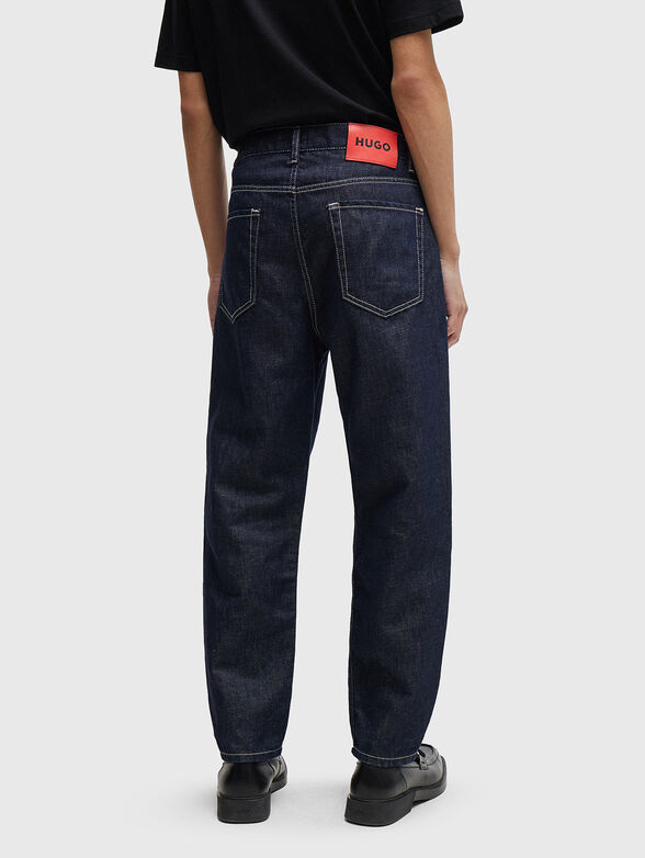 Dark blue jeans with contrast logo patch - 1