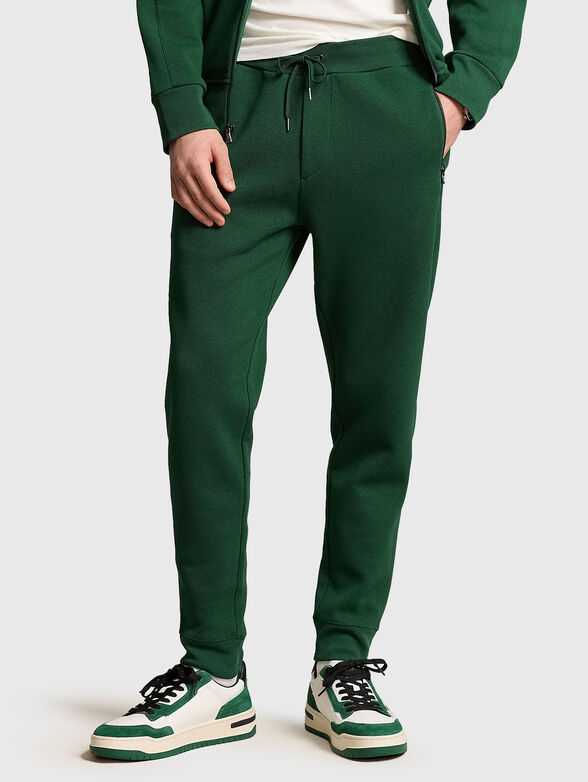 Green sweatpants with logo - 0